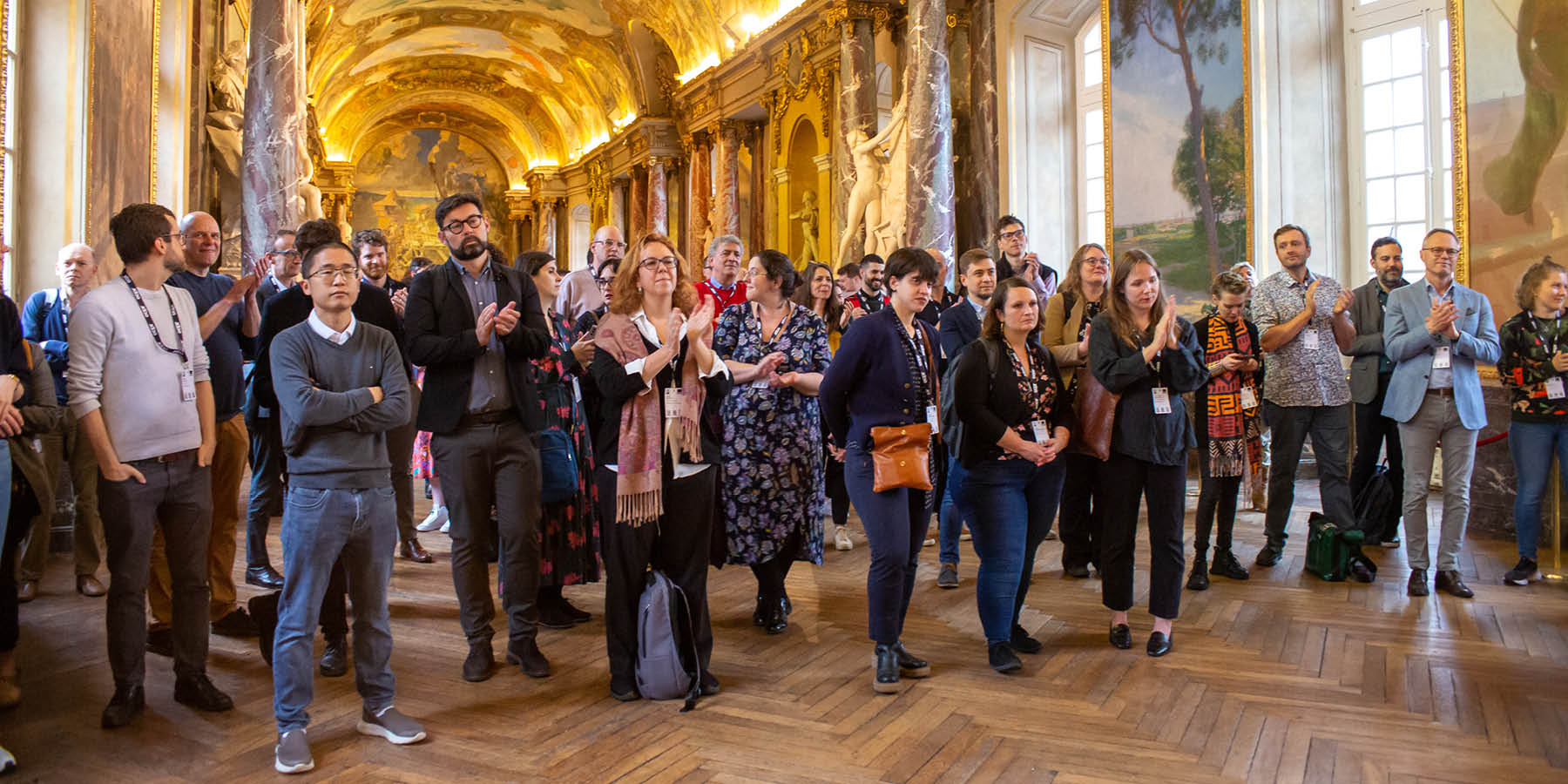 Group of people applauding 2023 timeline image